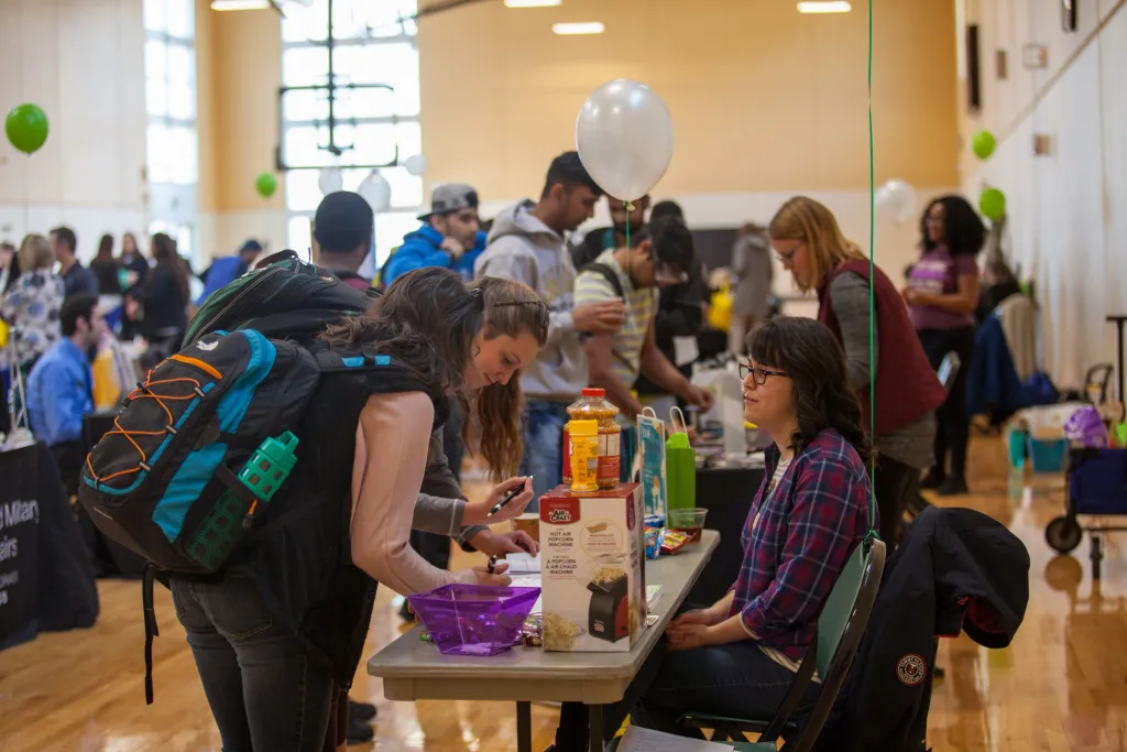 students talking at job fair